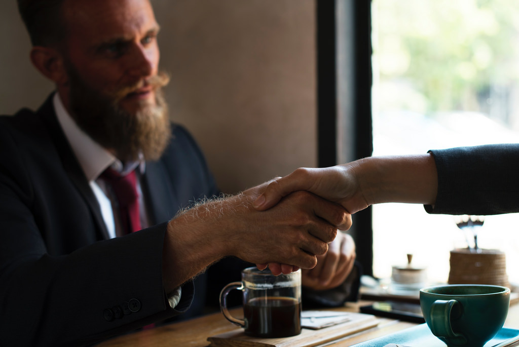 consulting handshake coffee